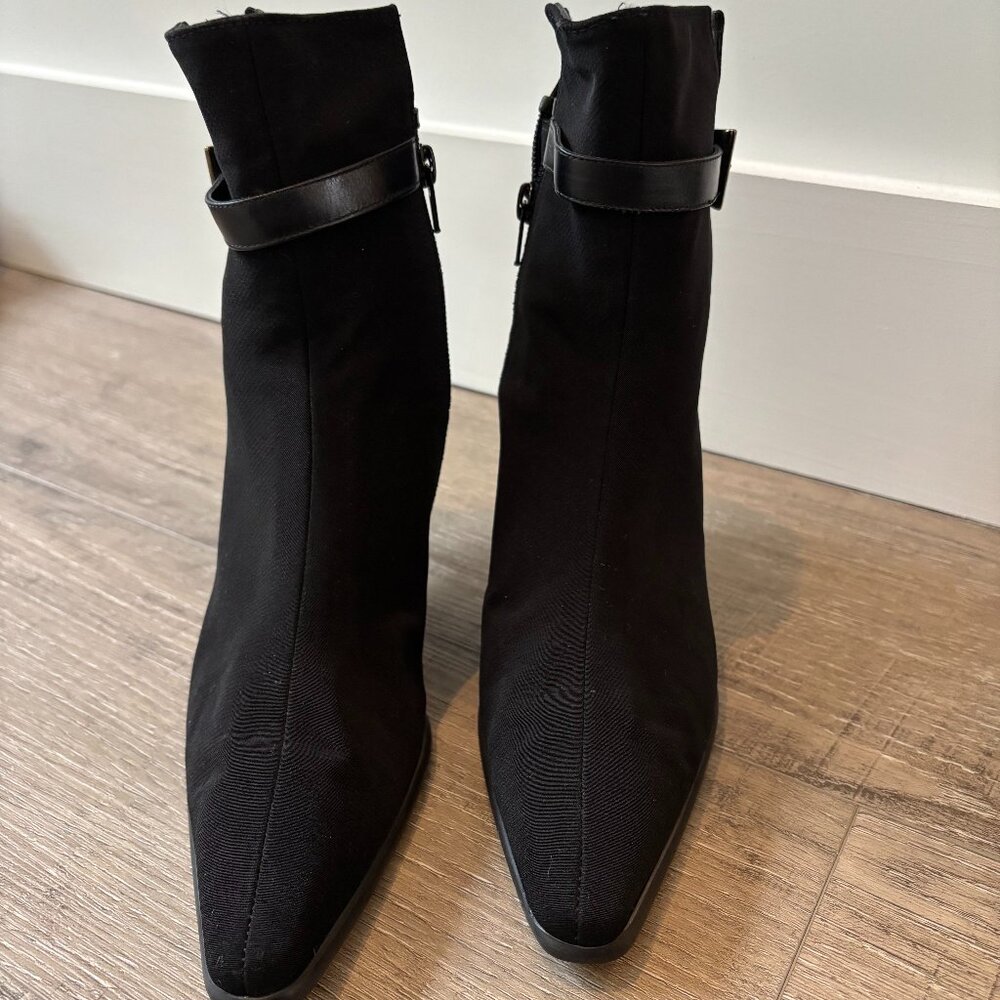 Stuart Weitzman black ankle boots, zippered with silver buckle accent